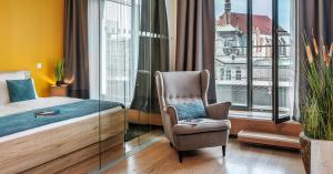 Giường trong phòng chung tại VN3 Terraces Suites by Adrez +39 ảnh