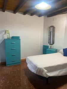 Giường trong phòng chung tại Apartamento Nora