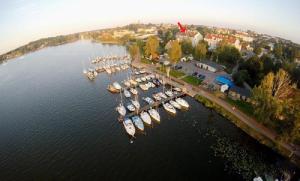 an aerial view of a marina with boats in the water at Apartament Wiśniewski - nad Jeziorem Drwęckim in Ostróda