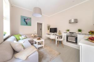 A kitchen or kitchenette at H75 Apartments Kosice Centre