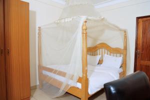 Postel nebo postele na pokoji v ubytování kadaali guesthouse