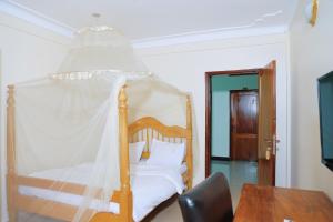 Postel nebo postele na pokoji v ubytování kadaali guesthouse