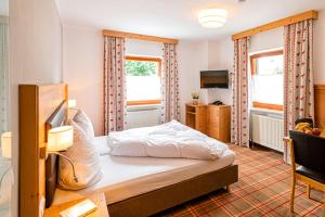 Postel nebo postele na pokoji v ubytování Kur- und Feriencamping Max 1 + 32 fotografií