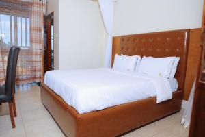 Postel nebo postele na pokoji v ubytování kadaali guesthouse