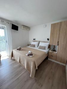 Posteľ alebo postele v izbe v ubytovaní Villa Dražana