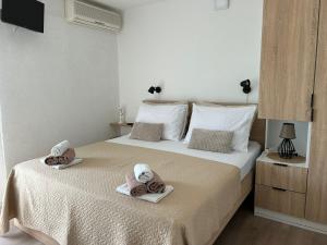 Posteľ alebo postele v izbe v ubytovaní Villa Dražana