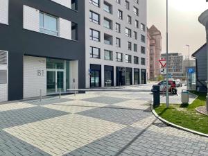 an empty street in front of a building at Top in Bratislava