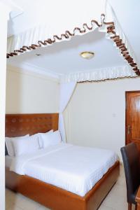 Postel nebo postele na pokoji v ubytování kadaali guesthouse