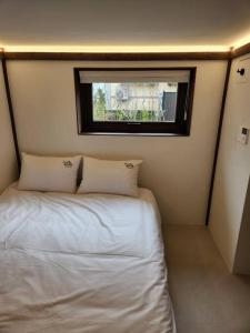 Кровать или кровати в номере Seoul Hanok near Seoul Station