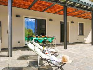Patio nebo venkovní prostory v ubytování Dascio Paradise Ferienwohnung mit Dachterrasse am See