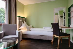 Ein Bett oder Betten in einem Zimmer der Unterkunft Insulaner Dependance