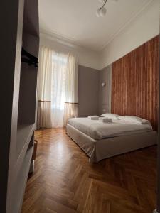 Postel nebo postele na pokoji v ubytování Turin Central Cavour + 28 fotografií