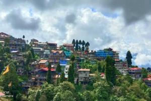a group of houses on top of a hill at Darjeeling CoLiving Home in Darjeeling