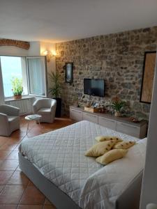 Postel nebo postele na pokoji v ubytování Romantic Home - Lake Como