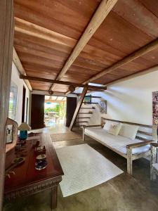 Ένα ή περισσότερα κρεβάτια σε δωμάτιο στο Casa Aratu - Caraíva