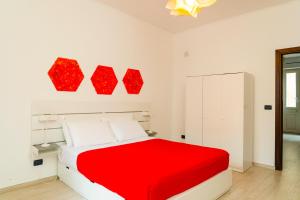 A bed or beds in a room at Casa Relax Mondello