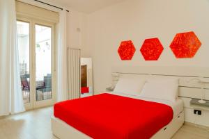A bed or beds in a room at Casa Relax Mondello