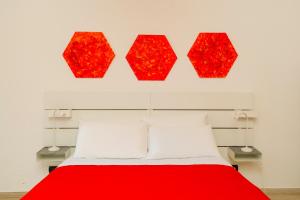 A bed or beds in a room at Casa Relax Mondello