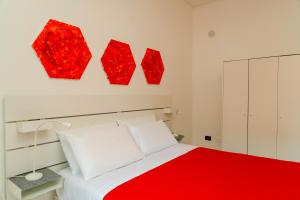A bed or beds in a room at Casa Relax Mondello