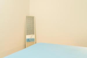 A bed or beds in a room at Casa Relax Mondello