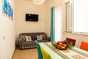 A television and/or entertainment centre at Casa Relax Mondello
