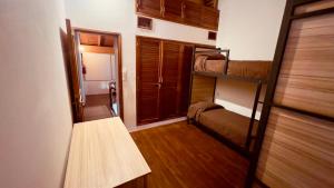 Hostel Falucho客房内的一张或多张床位