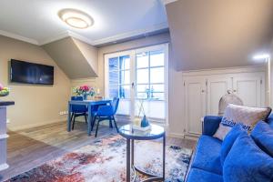 TV a/nebo společenská místnost v ubytování Heefwai-2-W5