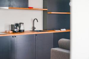Kuchyň nebo kuchyňský kout v ubytování Hotel Mezza Notte
