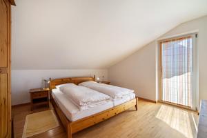 Posteľ alebo postele v izbe v ubytovaní Gasserhof Ferienwohnung Morgenduft