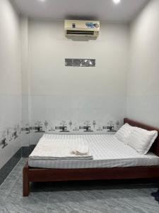 Krevet ili kreveti u jedinici u okviru objekta Nhà nghỉ Sunmi
