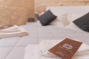 Posteľ alebo postele v izbe v ubytovaní DIMORA BAROCCA Apartment Irene