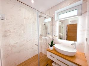 Kúpeľňa v ubytovaní M26 Prémium apartmanok