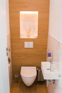 Kúpeľňa v ubytovaní M26 Prémium apartmanok