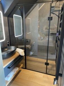 Kúpeľňa v ubytovaní M26 Prémium apartmanok