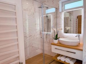 Kúpeľňa v ubytovaní M26 Prémium apartmanok