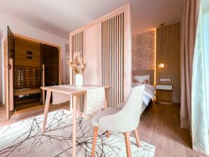 Posteľ alebo postele v izbe v ubytovaní M26 Prémium apartmanok