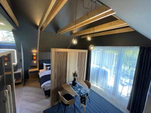 Posteľ alebo postele v izbe v ubytovaní M26 Prémium apartmanok