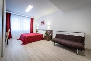 Postel nebo postele na pokoji v ubytování Hotel Cajeta