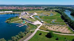 an aerial view of a park next to a river at Studio entre Disney & Paris proche lacs in Torcy