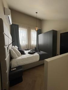 Postel nebo postele na pokoji v ubytování Hotel Mezza Notte