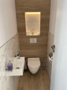 Kúpeľňa v ubytovaní M26 Prémium apartmanok