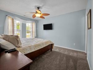 מיטה או מיטות בחדר ב-Liberty Hills Retreat