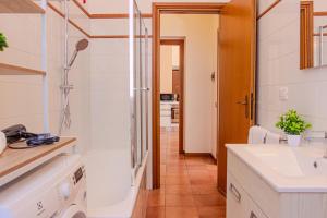 Ванная комната в La ringhiera fiorita - 102 Autodromo F1 & Villa Reale