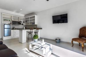 Una cocina o cocineta en Jr Suite 1 - Playa Arcangel