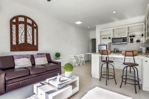 Una cocina o cocineta en Jr Suite 1 - Playa Arcangel