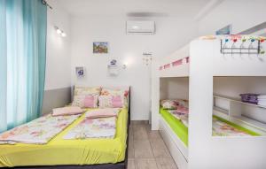 Posteľ alebo postele v izbe v ubytovaní Villa Dora ##2