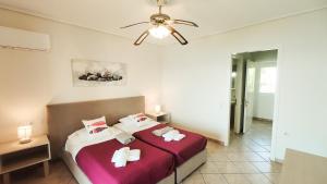 Ένα ή περισσότερα κρεβάτια σε δωμάτιο στο Villa Milka