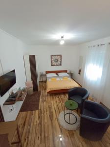 Postel nebo postele na pokoji v ubytování Apartments Toni