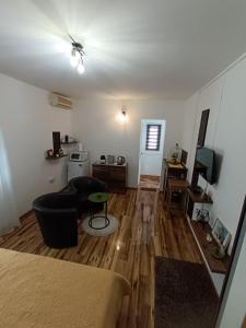 TV a/nebo společenská místnost v ubytování Apartments Toni