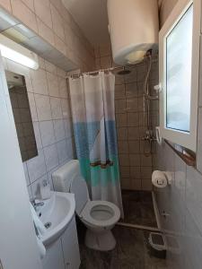 Koupelna v ubytování Apartments Toni